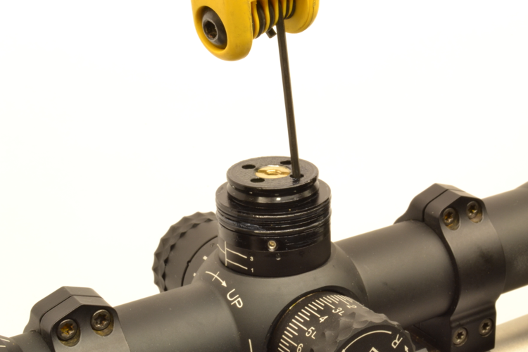 2 of 2, then adjust the zero stop and replace the turret cap, also set to `mark` zero
