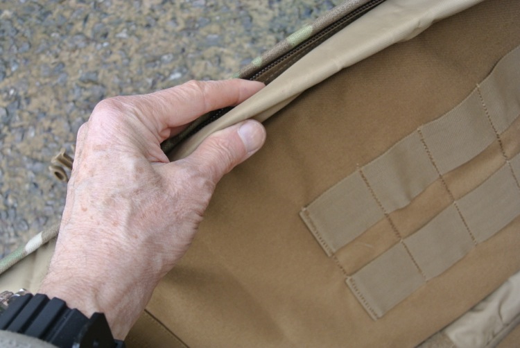 Padded section under the zip helps protect the scope.