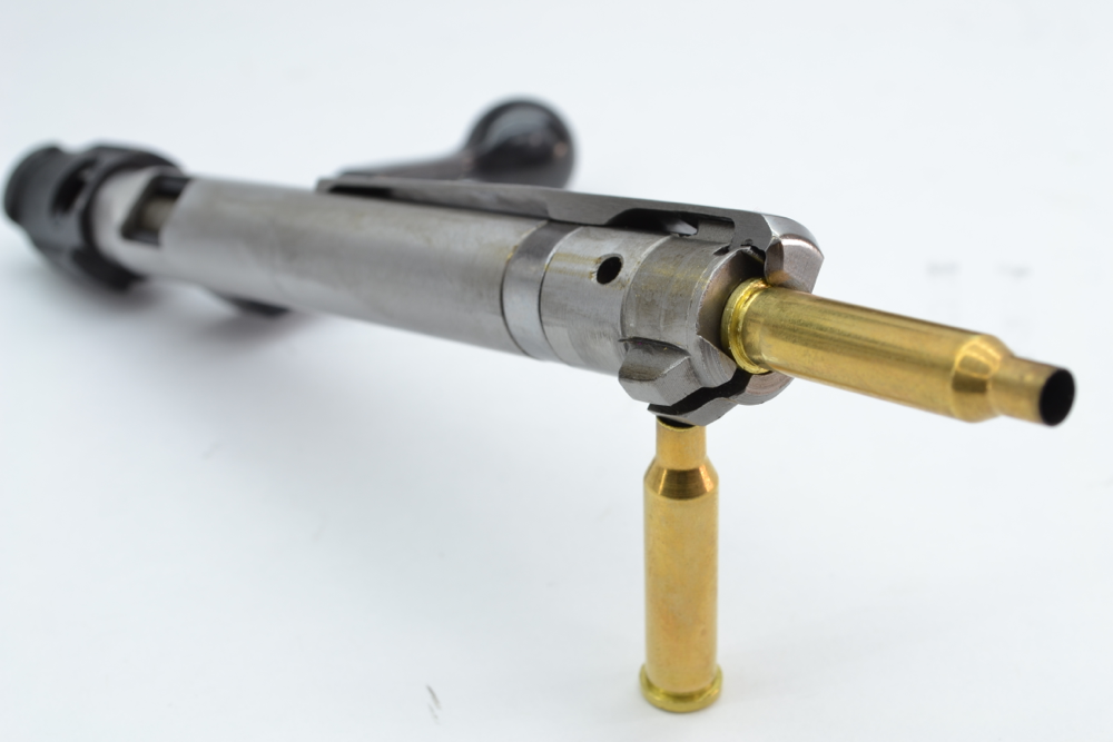 The controlled feed of the Mini-Mauser bolt suited the diminutive cartridge design.