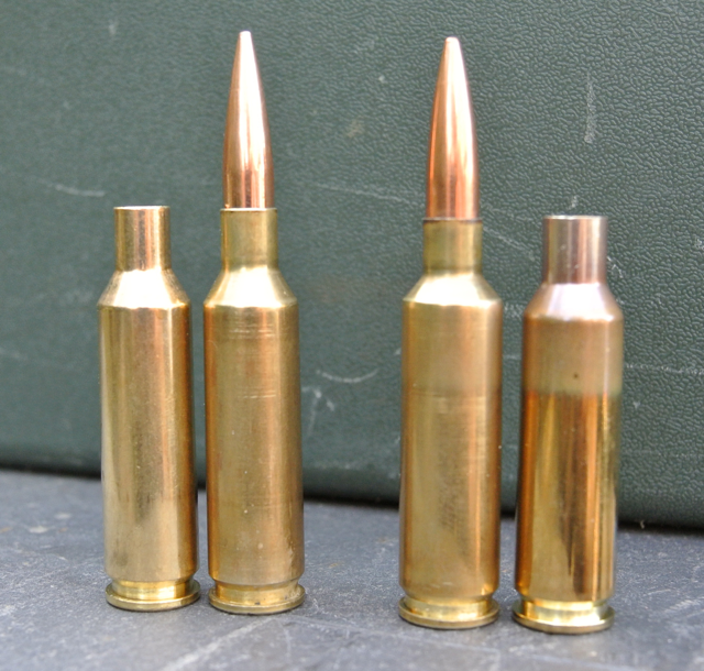 6XC left and 6mmSmack right, flanked by their parent cases. The 6XC can be shot straight out of the box – unlike the Smack, which requires necking-down and fireforming
