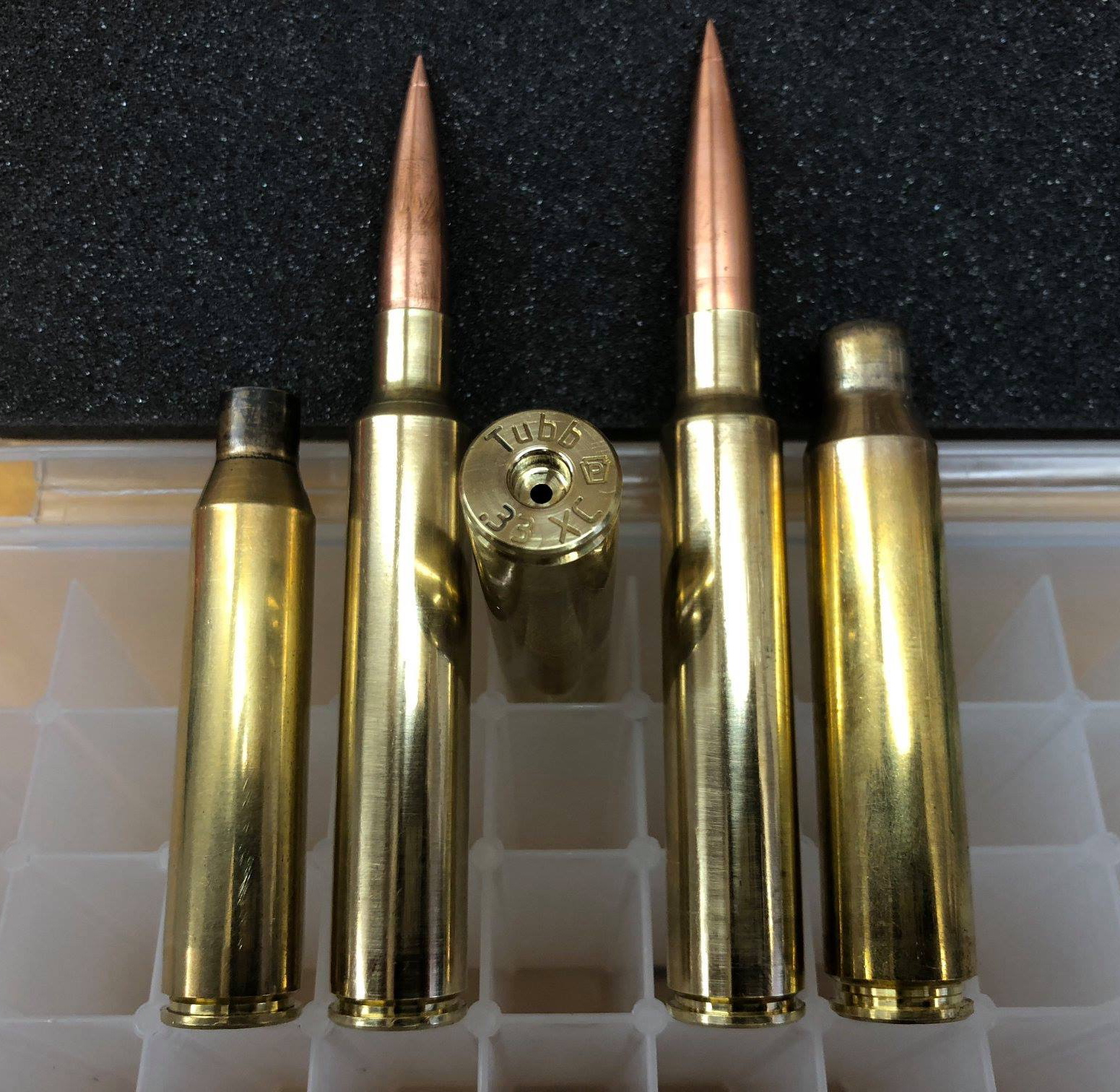 338 lapua ammo vs 50 bmg